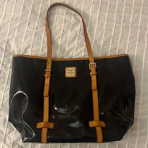 Used Dooney and Burke patent leather black , red interior